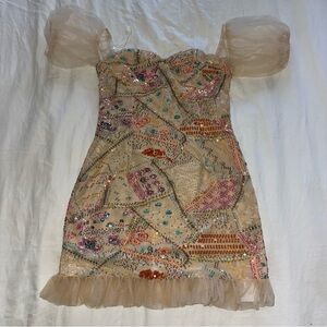 Size small women’s multi colored sequin mini dress with tulle